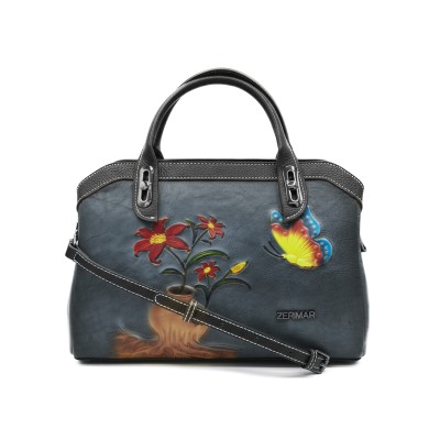 Bolso de piel grabado con...
